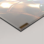 A close-up of a transparent 4mm acrylic glass showing the Bullion artwork details at an angle against a light grey background.