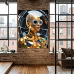 A large framed wall art print depicting a glossy gold woman model with flower-like diamond sunglasses, displayed on a brick wall in a modern loft room with wood floors and large windows.