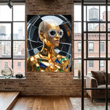 A large framed wall art print depicting a glossy gold woman model with flower-like diamond sunglasses, displayed on a brick wall in a modern loft room with wood floors and large windows.