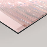 A close-up of a 4mm acrylic glass glossy rectangular panel with an abstract iridescent surface showing pink, peach, and gray tones, photographed at an angle against a light gray background.