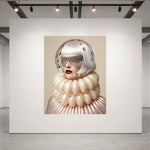 A surreal museum-grade artwork displayed on a large white wall in a gallery. The work features a woman with a clear glass dome helmet, a large cream-colored balloon-like glass collar, and red lips set against a beige background.
