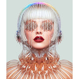 A stylized portrait artwork of a woman with a silver-white bob haircut, rainbow-colored beaded headband, rhinestone eye masks, red lipstick, and a metallic rose-gold ribbed top against a pale gray background.