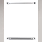 Two grey metallic hanging rails on a white background set on a grey wall.