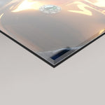 A close-up of a glossy, reflective 4mm acrylic glass panel of the Mint Kintsugi artwork by MizDragonfly shown against a light grey background.