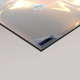 A close-up of a glossy, reflective 4mm acrylic glass panel of the Mint Kintsugi artwork by MizDragonfly shown against a light grey background.