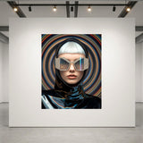 A fashion portrait of a gorgeous platinum blonde model set in a luxurious acrylic glass frame displayed on a white gallery wall. The model is wearing a glossy black helmet with crystal-striped sunglasses with a small gold M monogram set against a swirling multicolour vortex background