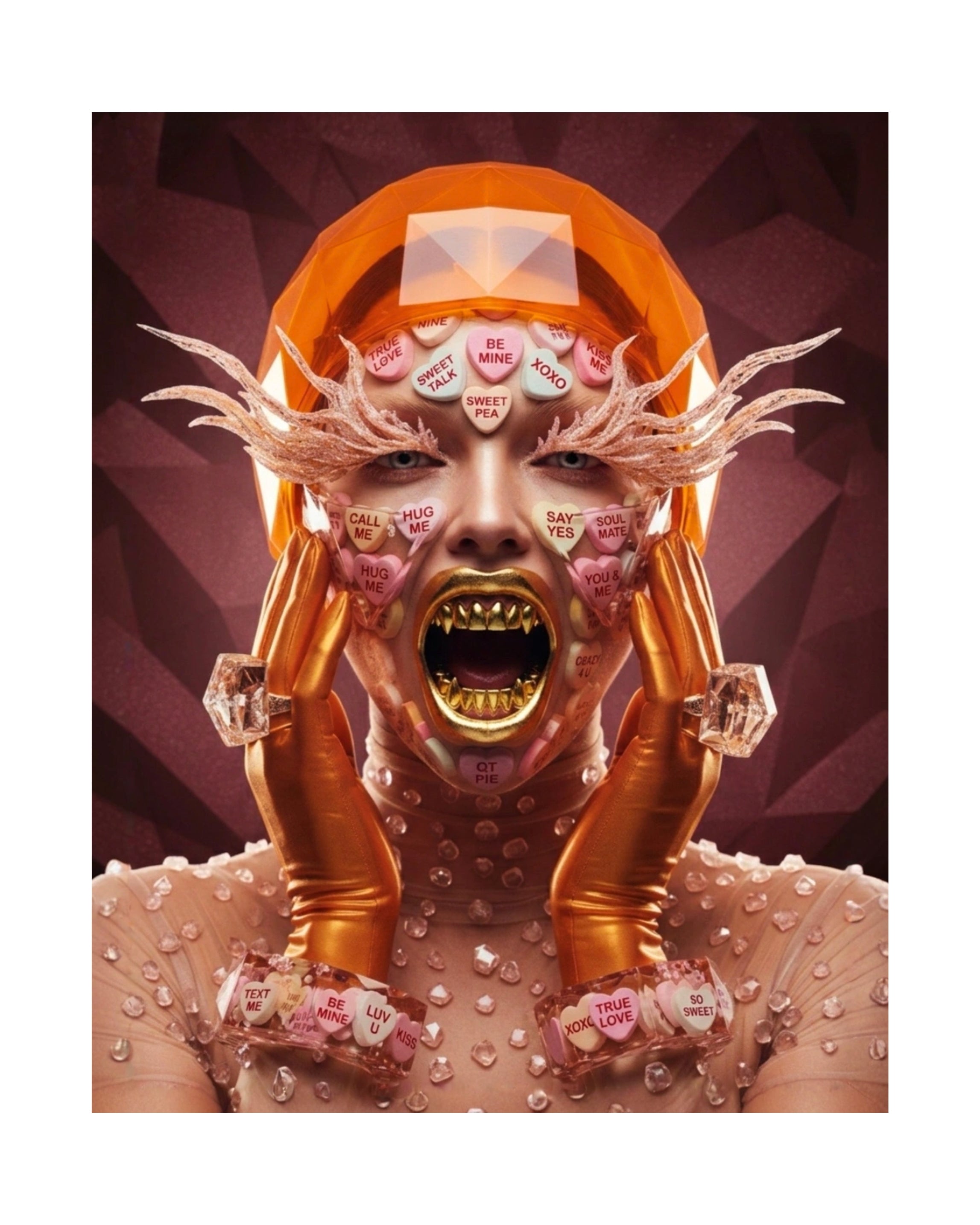 Digital surrealist portrait "Be Mine" featuring a translucent, glass-like bust filled with pastel conversation hearts, accented with gold-fanged teeth and geometric high-fashion rings and bracelets also featuring valentine conversation hearts. Bright orange and burgundy colours. Artwork by MizDragonfly.
