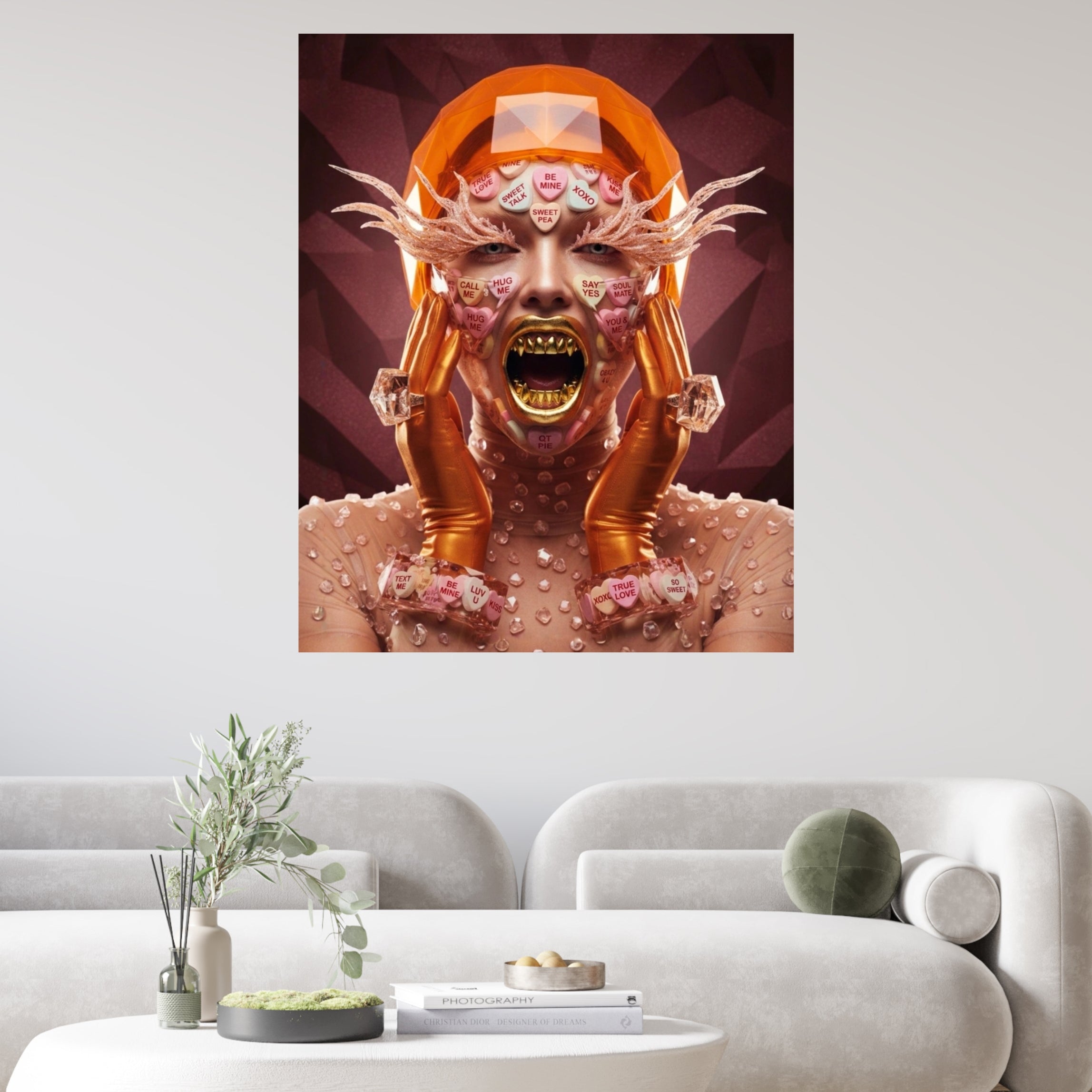 Lifestyle illustration of the "Be Mine" artwork showing hyper-realistic textures of melting sugar, crystalline skin, and a golden dental fang symbolizing the predatory side of consumerism feature don a wall in a white modern living room.
